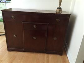 Antique buffet.  Two drawers, three doors.  Solid wood with dovetail joints.  Solid piece.