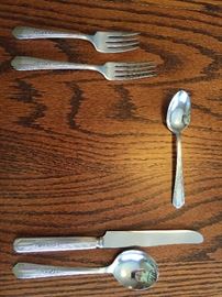 Wallace Deerfield silverplate service in "'Vision" pattern.  5-piece settings, as shown, for 8 people.  Total of 39 pieces (missing one knife)