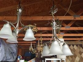 Brushed nickel chandeliers.