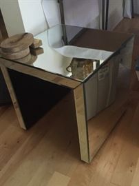 Mirrored cube end table.