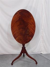 Baker tilt top table