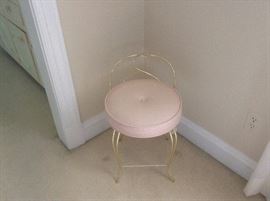Cool pink vanity chair.