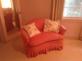 Pink Room: Custom fabric pink covered settee and pillows.