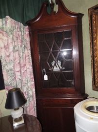 Two 1929 Herald Corner Cabinets