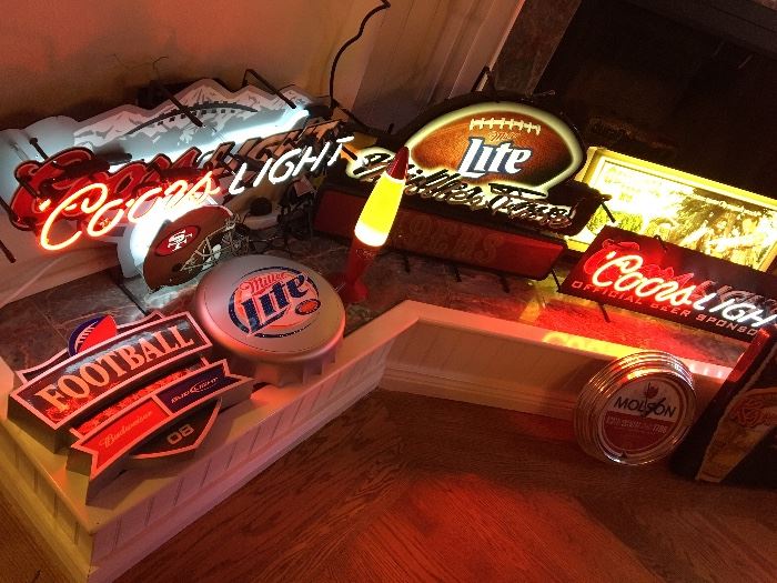 +/- 50 Lighted and Neon Bar Signs! In two rooms 