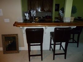 Four leather bar stools