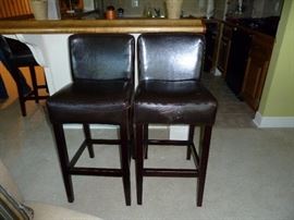 Four leather bar stools