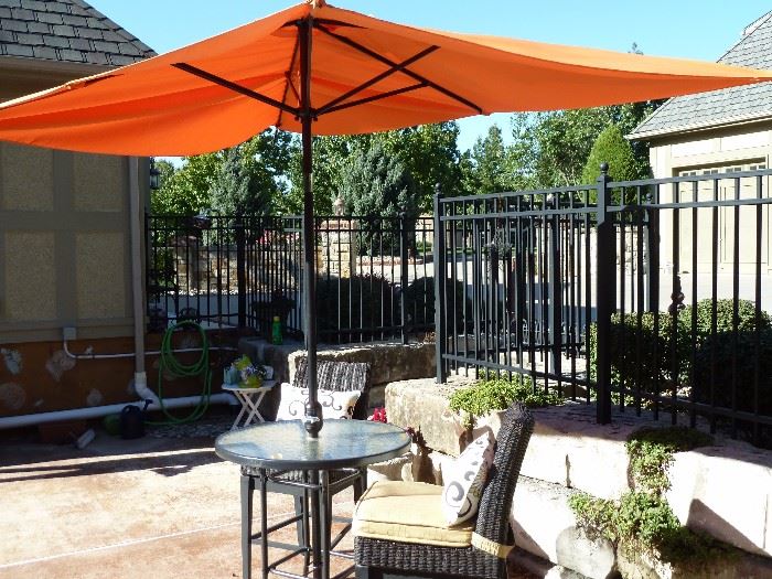 Nebraska Furniture Mart patio/outdoor furniture pub table, umbrella and pub chairs with cushions