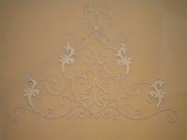 White wrought iron wall art