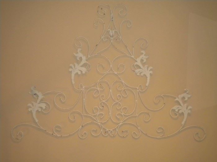 White wrought iron wall art