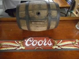 Antique whiskey barrel and Coors beer hat rack