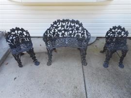 Wrought iron bench and chairs