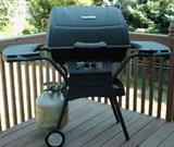 Very Nice propane BBQ grill.  Still some time for backyard fun!