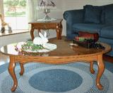 Matching coffee table and two end tables - colonial style.