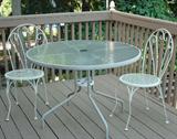 Umbrella patio table with two chairs.  We also have two umbrellas and one umbrella stand.