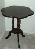 Very unique wood lamp table with scalloped top.  We have it's twin, as well.