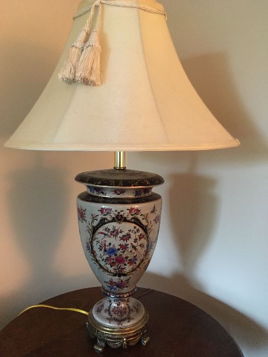 One of a matching pair of painted ceramic table lamps. No mark of maker. 