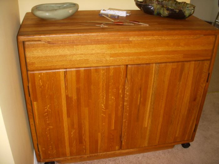 Oak portable cabinet (on casters).  Currently used in dining room.