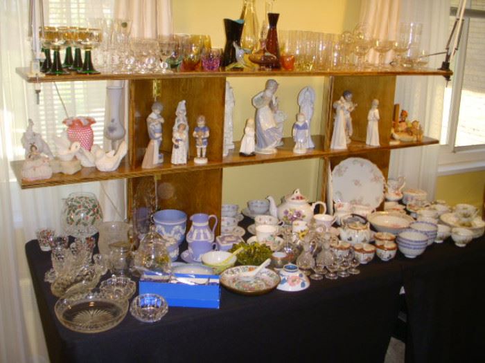 Display of collectible china and glass