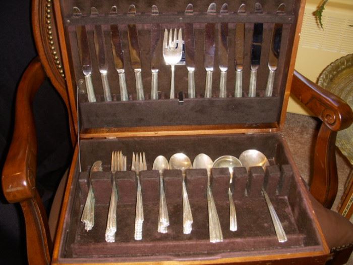Alvin "Chapel Bells" sterling flatware for 11 with extras.  This pattern is patented 1939.  Weigh-able pieces (everything but the dinner knives is included in the weight) total 69.57 troy ounces, or 2164.4 grams.  Weight not guaranteed.
