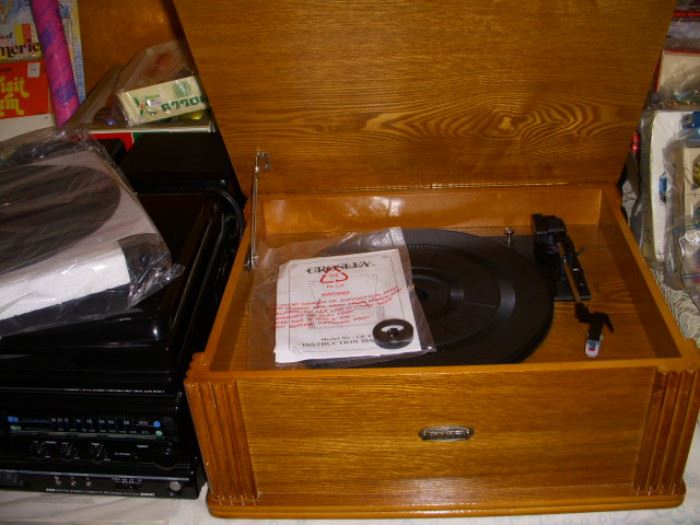 Stereos.  Oak one is a new Crosley turntable for playing your vinyl records