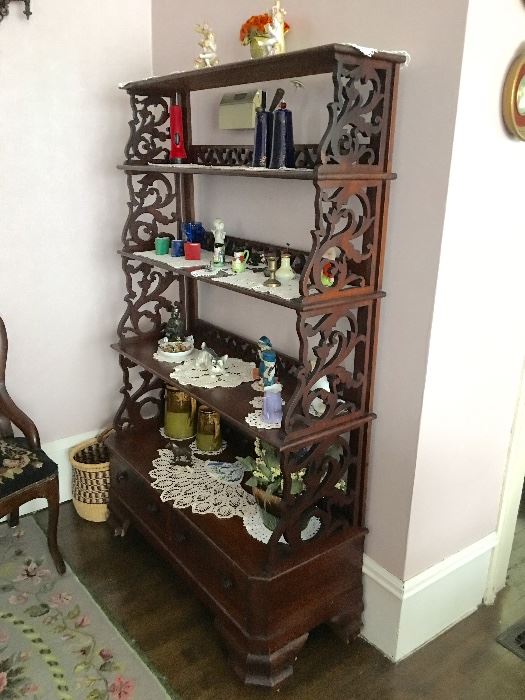 Living Room: Solid walnut etagere. CA 1860, 4 shelves, 2 drawers below, hand cut dovetail, all original and beautiful.