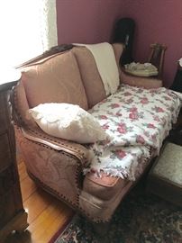 Main level bedroom: vintage sofa. Needs reupholstering. 