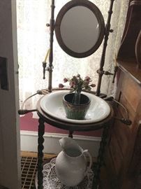 Main level bedroom: CA 1910 wash stand. Mixed woods, all original. Excellent condition.
