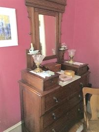 Main level bedroom: Solid walnut, Victorian, marble insert with original pulls. 