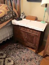 Upstairs NW bedroom: Small oak commode.