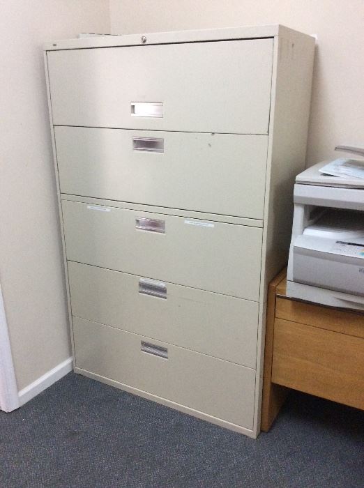 File Cabinets and tons of office desks, and office supplies