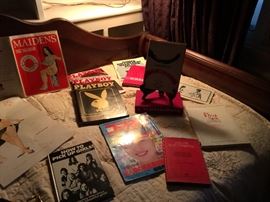 Magazines, pin up girls, lots of artwork, The Joy of Sex and many more books on Erotica