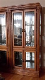2 large 4 door curios lighted / glass shelves