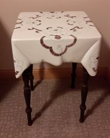 ceramic look top w/ wood legs table, very unique