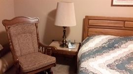 oak glider rocker / nitestand / brass lamp / oak bed / 