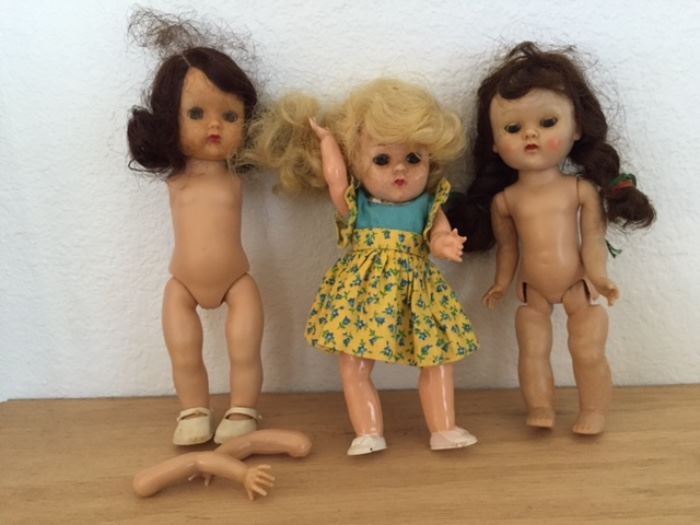 3 small dolls