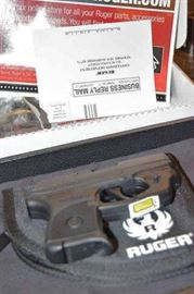 Ruger with laser box and paper never used