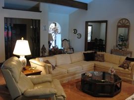Vintage sectional sofa and leather recliner.
