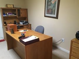 Desk, computer station, file cabinet. Original art work