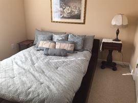 Platform bed, end table.