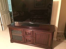 Mahogany entertainment center with 55" HDTV.