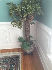 Artificial tree with chinese vase. Rug