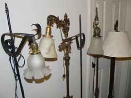 Antique floor lamps that are all in working order.  They have intricate details and would love great any any room.