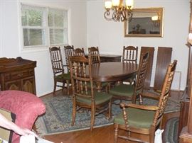 Dry sink server on wheels with copper top.  6 chairs plus two captain chairs.  The leaves are in the back of the pic.
