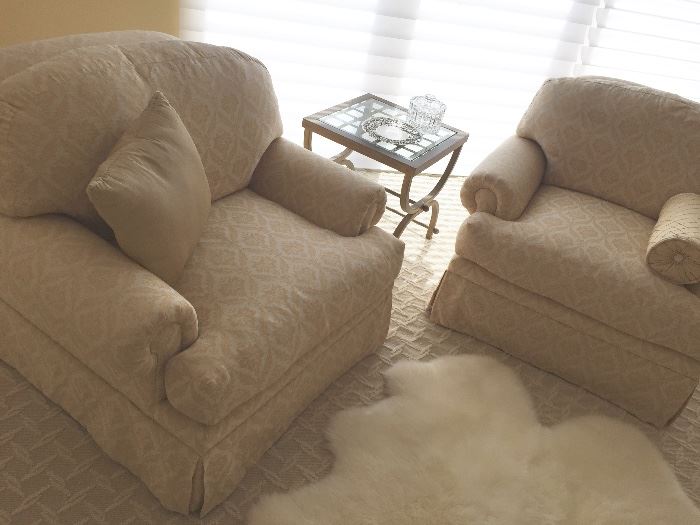 Beautiful club chairs with one large ottoman