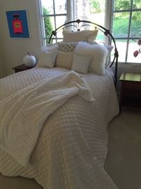 Lots of beautiful bedding and linens.  
