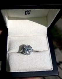 Platinum Diamond Ring  Center stone is 1.06 Karats VVS2 Color Grade F.
