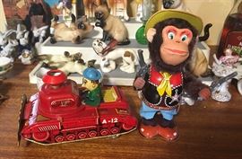 Vintage pressed tin toys made in Japan that work great.