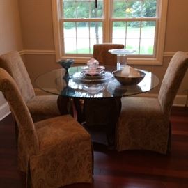 Perfect dinette for a nook. Glass top table and 4 chairs in perfect condition
