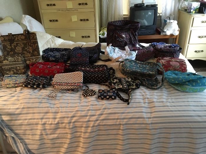 Vera Bradley hand bags, wallets, and travel bags
